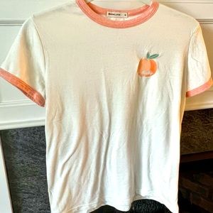 Marine Layer Ringer Tee with Peach “Cheeky” Patch